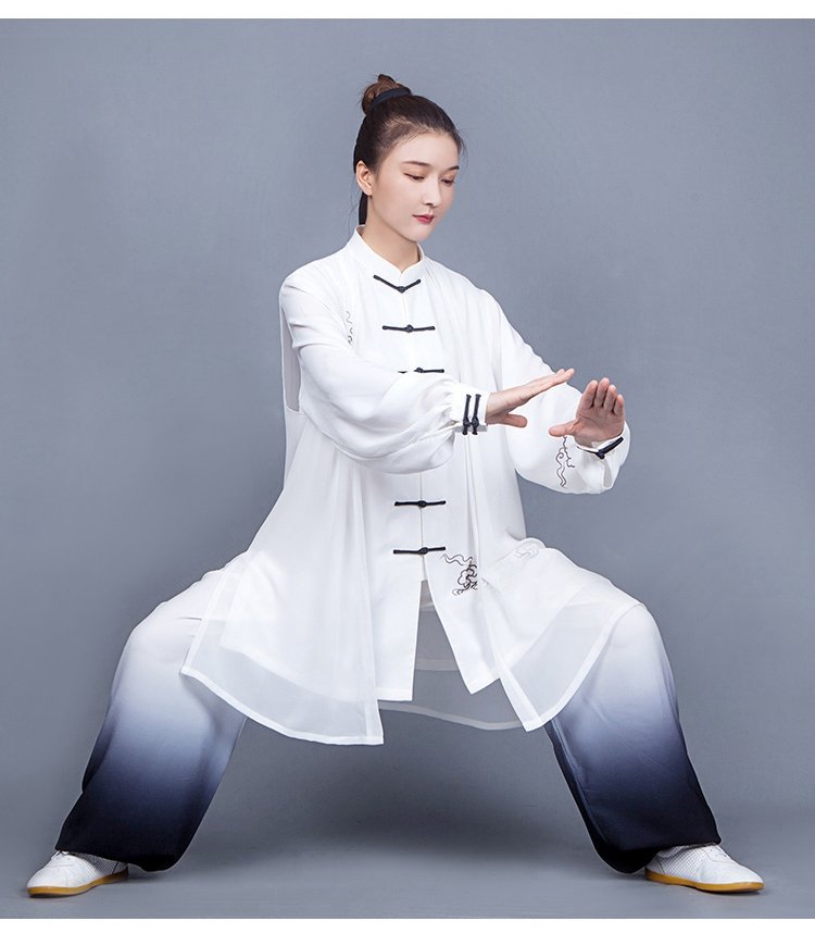 Woman practicing tai chi in uniform