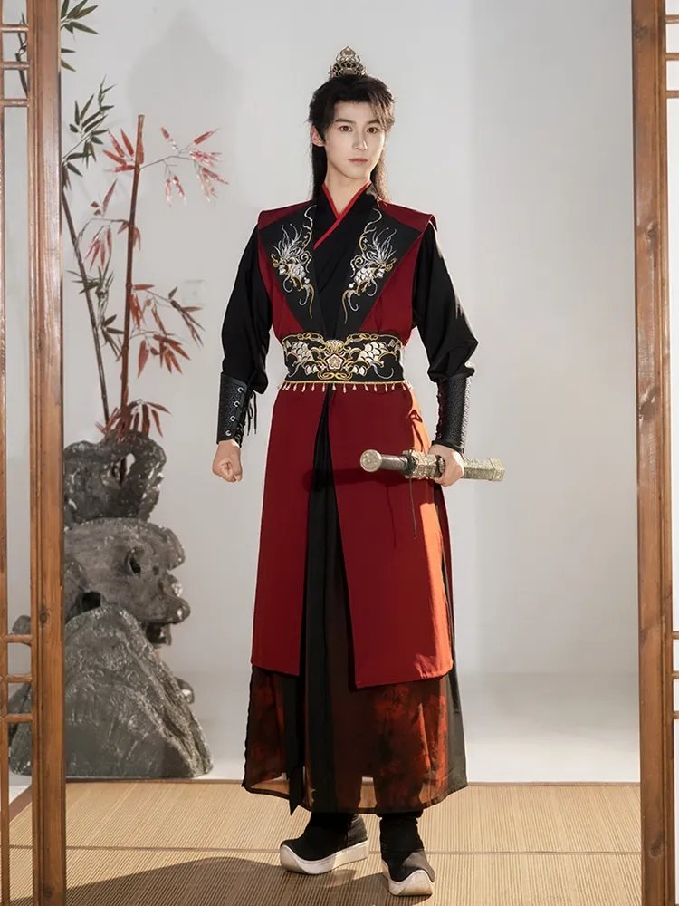 Red Wuxia-style Hanfu set for men with embroidered vest and cross-collar robe, inspired by ancient Chinese warrior aesthetics.