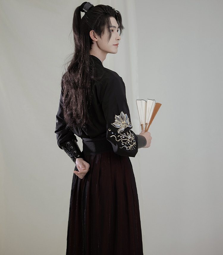Side view of Wuxia-style Hanfu robe for men showing embroidered sleeve and collar detail.