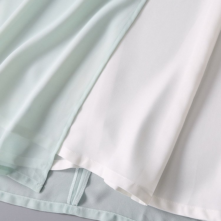 Bottom hem detail of gradient Zen tea dress