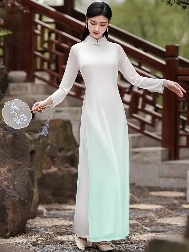 Model wearing ivory to mint gradient Zen tea dress, full-length view