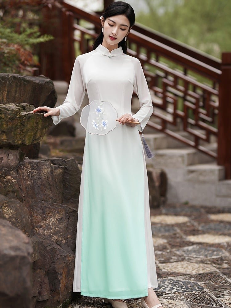 Woman in Zen tea dress walking in traditional tea garden