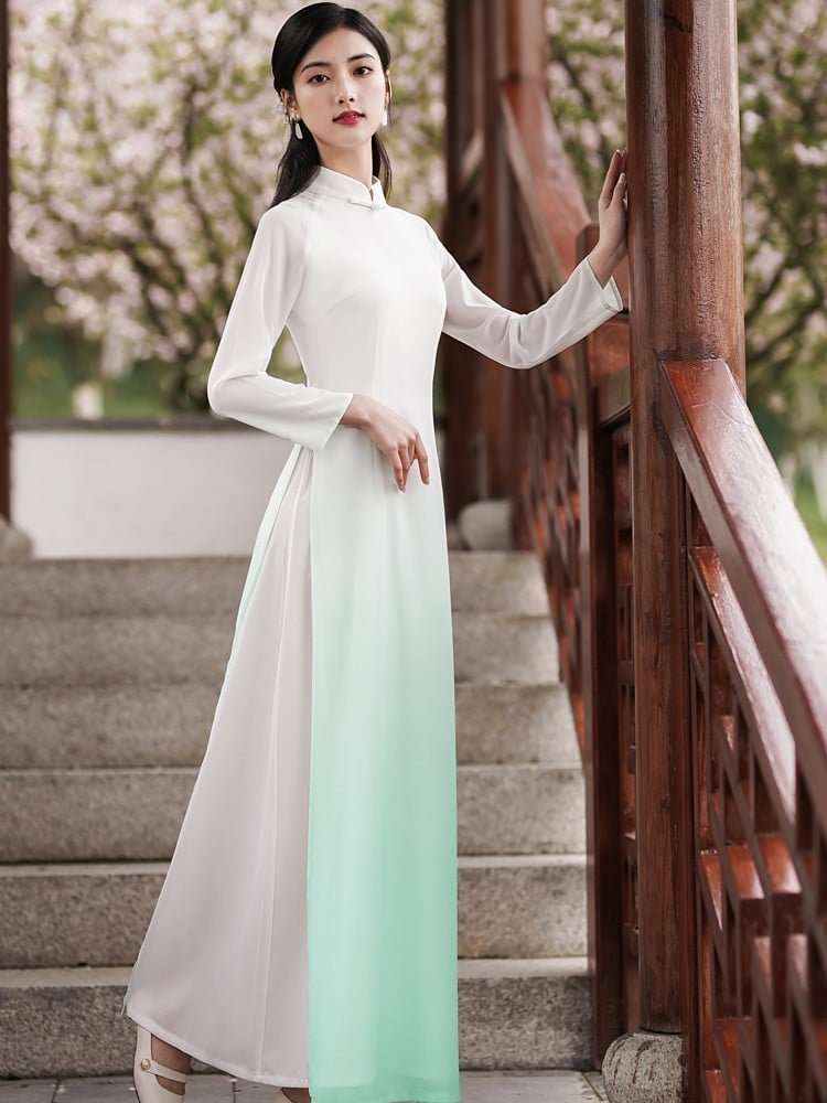 Side pose of woman in gradient chiffon Zen tea dress
