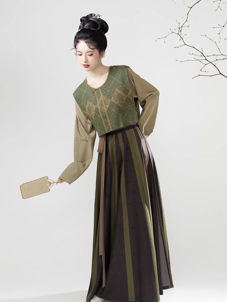 Model wearing green modern Tang style Hanfu dress with Beizi jacket and striped skirt