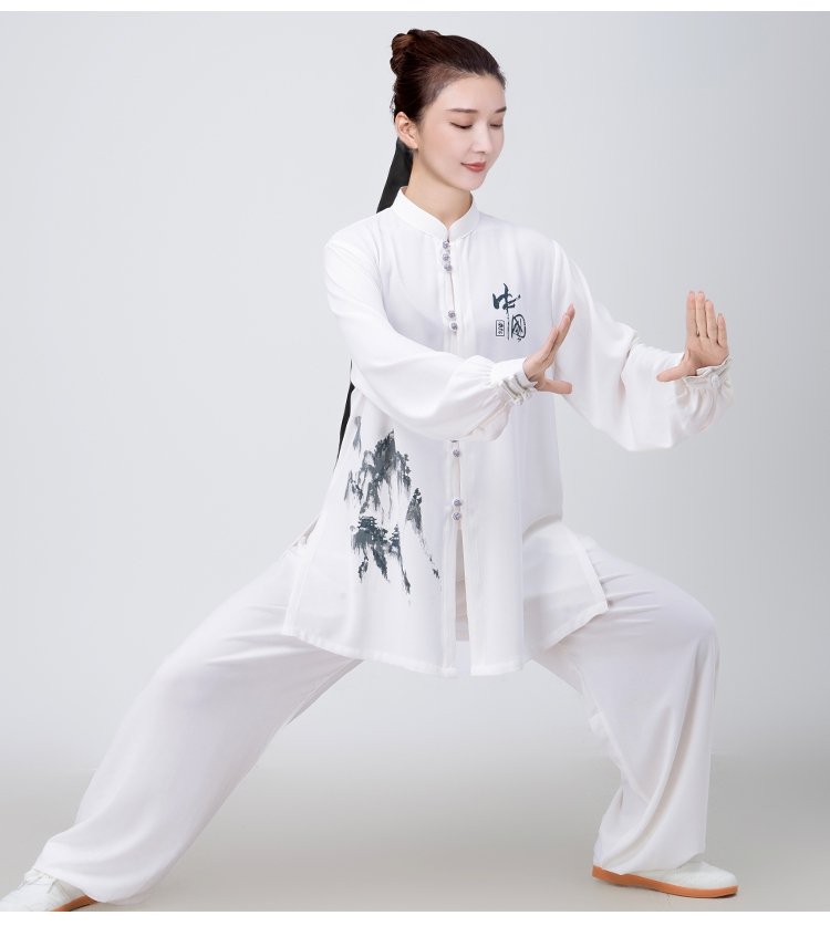 Tai Chi stance showing gradient pants and embroidery details