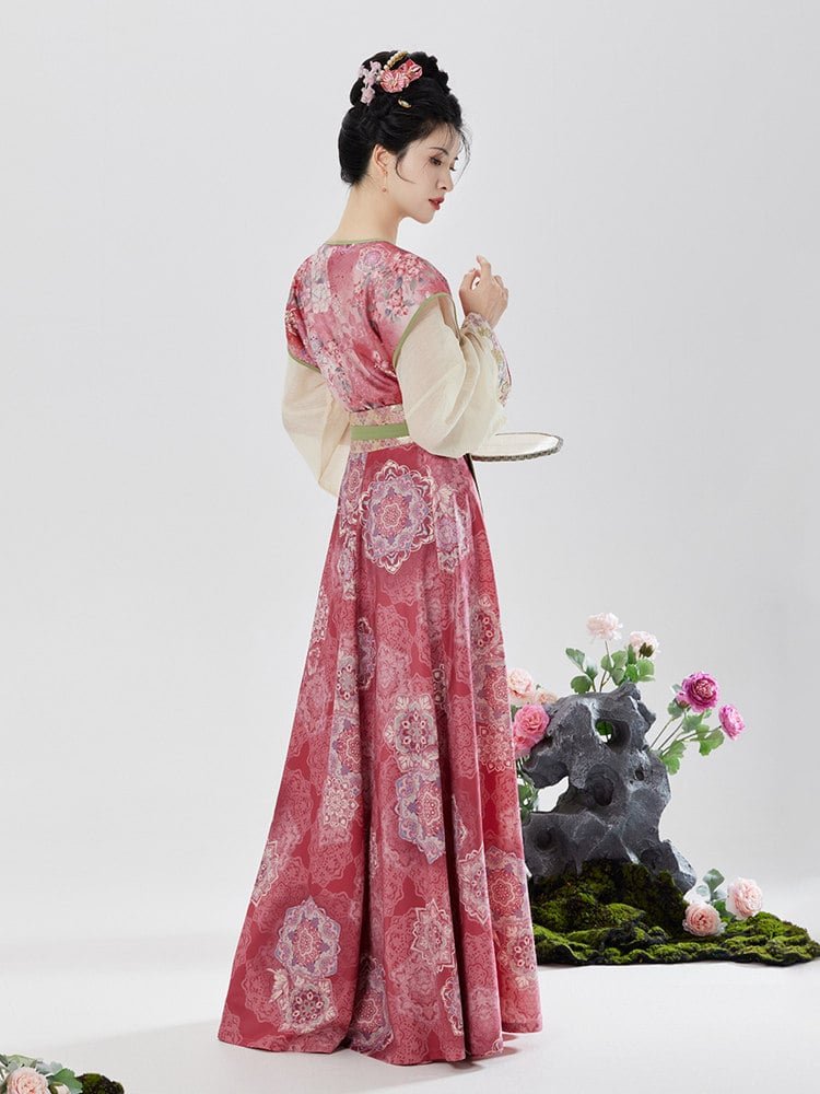 Model twirling in red floral Chinese Hanfu dress with high-waist skirt