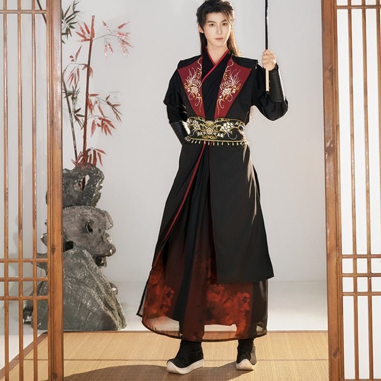 Embroidery detail on red Wuxia Hanfu vest showing crane and flame motif, symbol of heroism.